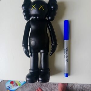 Authentic 2004 black Kaws Companion figure.